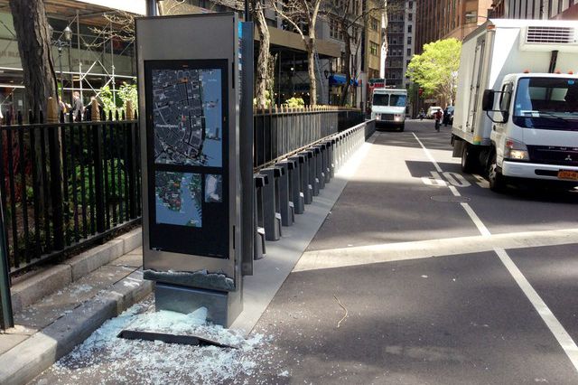 A vandalized bike share station at Hanover Square and Pearl Street.